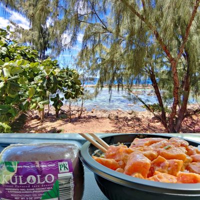 Spicy ahi poke bowl & kulolo, with an ocean view.