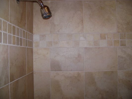 Custom wall tile installation with 2x2 border