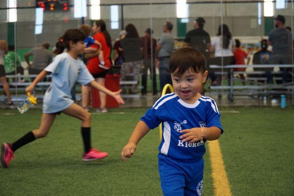 Toddler playing soccer