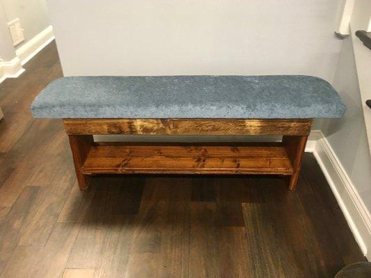 The fixed up bench with beautiful upholstery by Kylie and wood given new life by Jim.