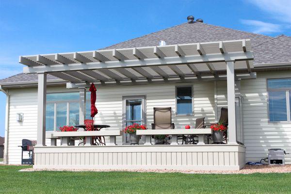 Azek Hazelwood Decking with an Adobe aluminum pergola by Great Plains Pergolas.