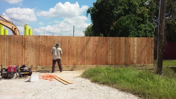 6' cedar fence with 2x12" base board