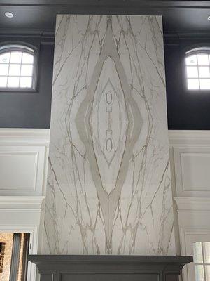 Formal Living Room Fireplace. Book-Matched Porcelain Slabs