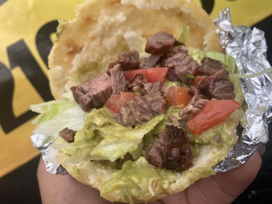 Famous Beef Fajita Gordita plus the works (guacamole, Pico de Gallo, Lettuce and Cheese)