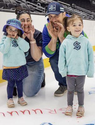 My family and I at the Kraken paint the ice event!