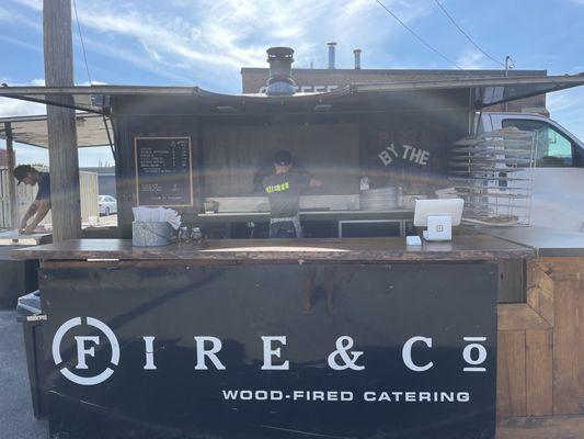 Wood-fires pizza oven food truck. How cool!