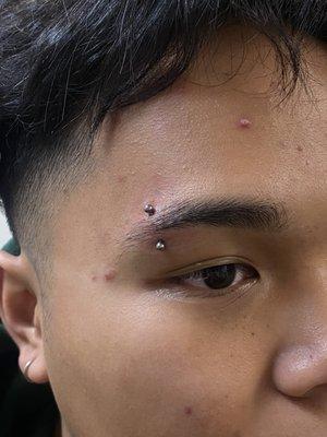 Eyebrow piercing with implant grade titanium