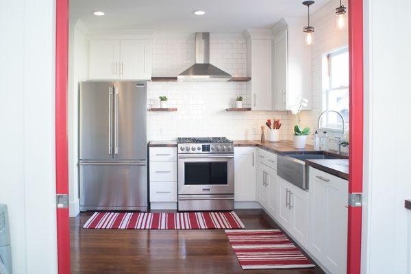 Kitchen remodel with walnut butcher block countertop.