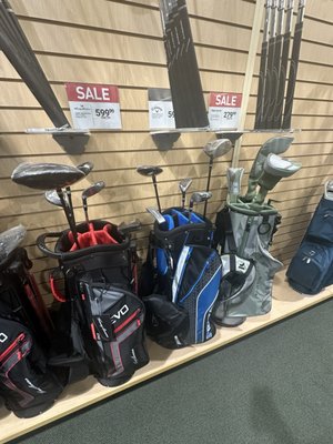 Half of club sets in rear of store