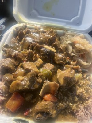 Curry goat with rice and peas and STEAMED CABBAGE MEDLEY