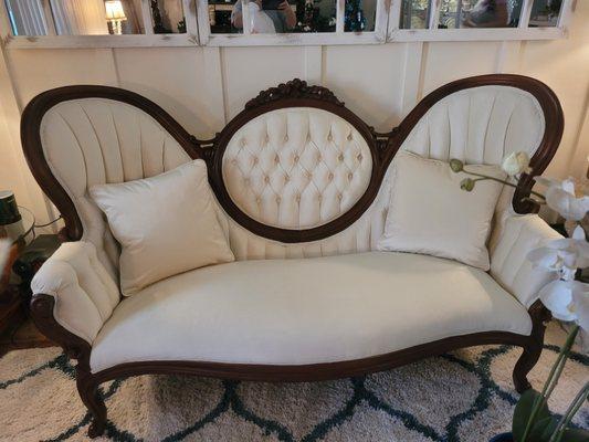 Antique tufted sofa