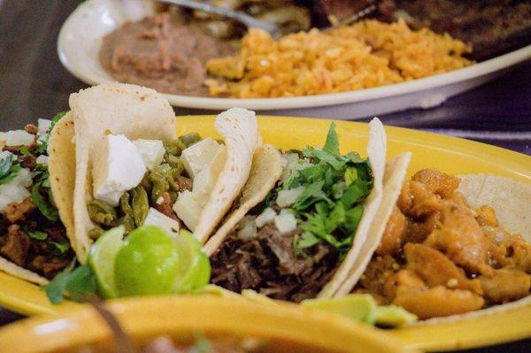 Variety of tacos with homedame mexican food every day where you can choose diferent dishes.