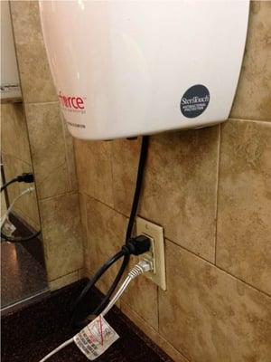 From the women's locker room.  It's an interesting placement for a hand dryer and my wet hands -- above electricity.