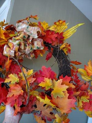 Faux fall wreath completely destroyed.