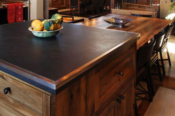 Concrete kitchen countertop with steel edging.