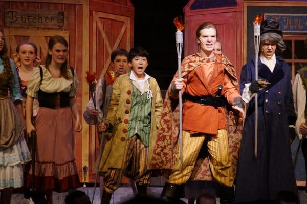 Benjamin Cheng as Gavroch, with Gaston in Beauty and the Beast.