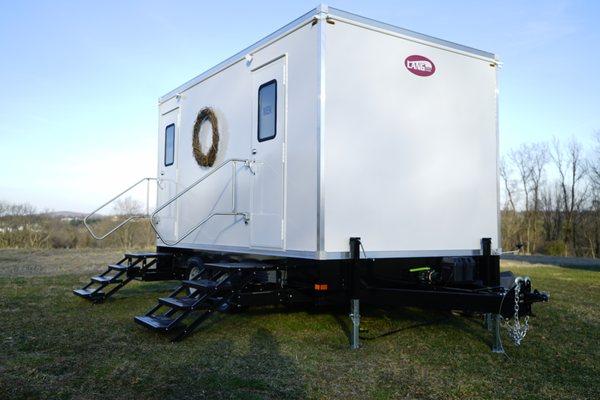 Here is our Classic model, 5 station restroom trailer. A clean and sleek look for a wedding or outdoor event.