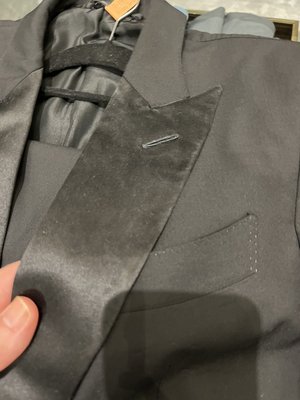 Tom ford lapel destroyed. Came back gray and originally was a beautiful shiny black.