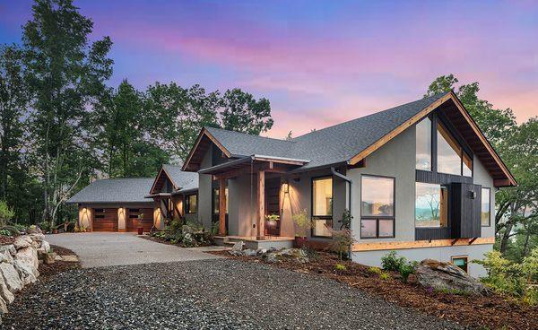 Timeless modern custom home build at twilight.