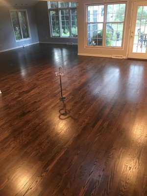 Sanded and finished a remodeled house with a spice brown stain and 3 coats of polyurethane