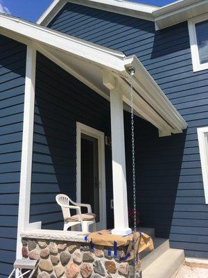 ADDITION ENTRY PORCH AND RAIN CHAIN NOT IN YET