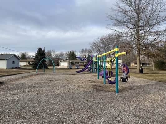 Playground area with zip line and swings