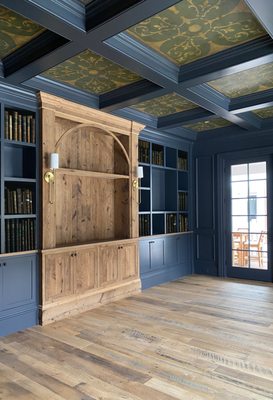 Academia Aesthetic Custom designed, stenciled and hand painted coffer ceiling in home library with bookshelf wealth.