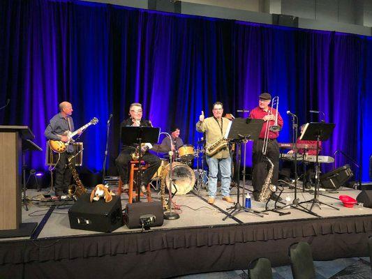 Integrated Family Community Services Nibbles and Sips Gala by playing with the Jazz Hands Foundation Band.