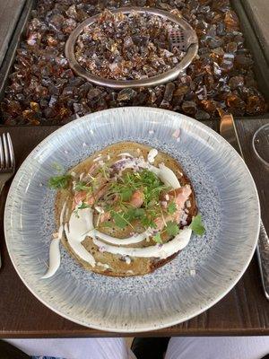 Ingenious combination of flavors--smoked Arctic char on a pancake with local micro greens and an amazing drizzle. HEAVEN on a pretty plate!