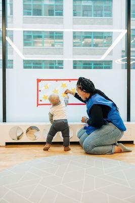 Our infant program is individualized to support each baby's growth and prioritize exploration in a safe and loving environment.