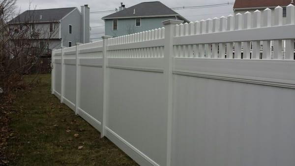 Semi private white vinyl fence, installed in Peabody MA.