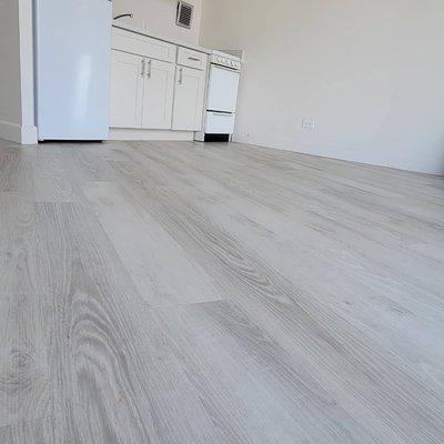 Snow White Viloor Luxury Vinyl Flooring matching white kitchen cabinets well...