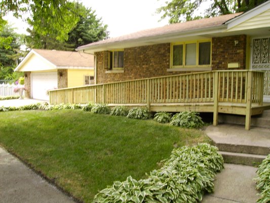 Wooden Wheel Chair Ramp Installed by Home Access Services