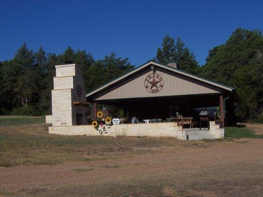 Our Pavilion with additional area added own with rock fireplace