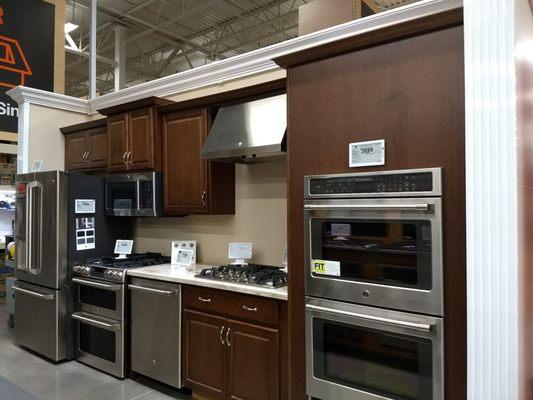 Staged kitchen that has a very nice aesthetic but questionable quality.