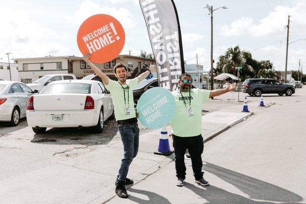 People welcome others to Christ Fellowship Church in Belle Glade, FL