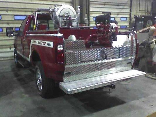 A fire truck that had the back entirely customized at Springfield Welding