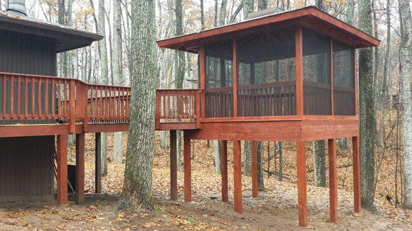 Screen room with hip roof, skylight, off new deck.