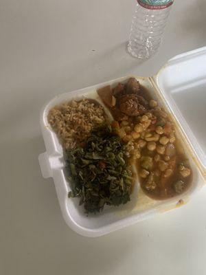 Chicken collard greens chickpeas curried and fried plantain rice and peas. delicious meal very flavorful and appetizing.