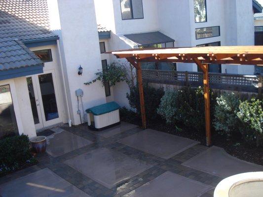 This is a rough cedar pergola by Bills Custom Wood