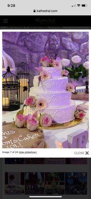 A beautiful wedding cake with fresh flowers.