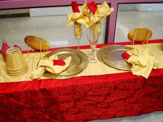 Table Set includes: tablecloth, runner, chargers, glasses, napkins etc. - $25 (set)