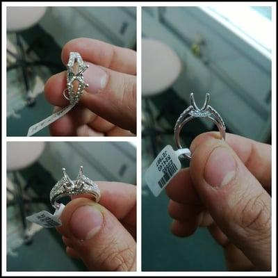 18kt white gold split ring with 0.65 ct diamonds. Diamonds are set on the top and the side for a unique and beautiful finish