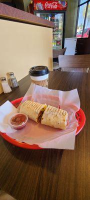 Breakfast burrito with coffee