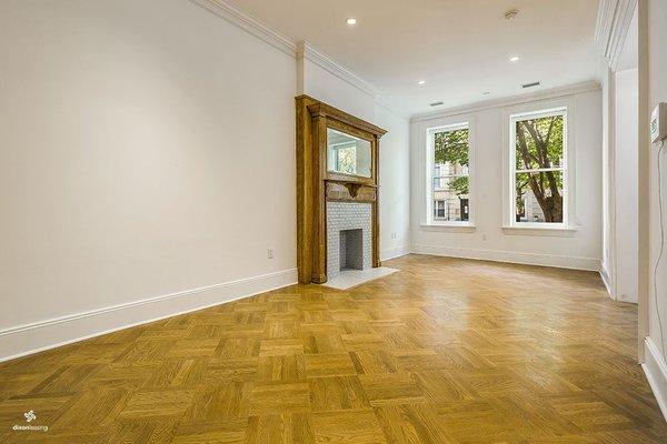 Bedroom with an old fireplace completely restored