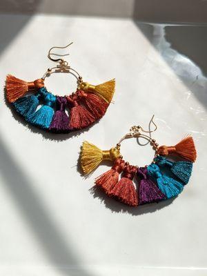 Earrings by Woven Goods Studio.