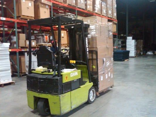 MedShare warehouse staff loading a container