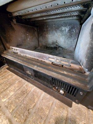 Photo inside fireplace insert after vacuum + the last fire which was April 2, 2021. Now time to inspect and clean with Home Care.  4/28/2021