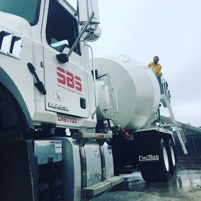 SBS Cement Mixer delivering Ready Mix Concrete to a jobsite