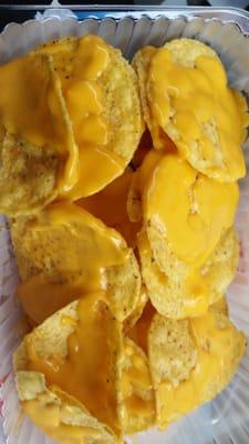 Nachos drowned in cheese!